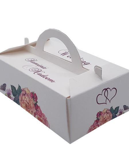 Watercolor flowers in peach and pink with green leaves