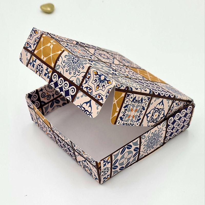 Elegant wedding favour box with Moroccan-inspired patterns