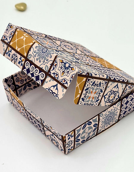 Elegant wedding favour box with Moroccan-inspired patterns