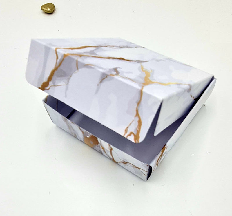 wedding favours in square size party bags and fillers can be used as 
party boxes and fillers on white card