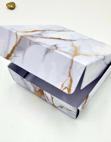 wedding favours in square size party bags and fillers can be used as 
party boxes and fillers on white card