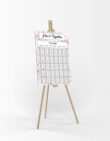 A1 personalised portrait Wedding Table Plan mounted on board can be placed 
on easel with Pink cherry blossom flowers in the background