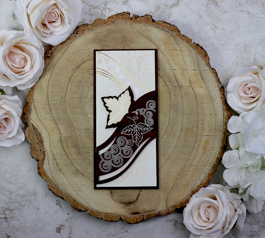 Front view of WN075 Ivy Leaf Carved Brown Wooden Invitation, showcasing intricate ivy leaf patterns carved into brown wood, paired with ivory cardstock for a striking and elegant design from Shadi Cards.com